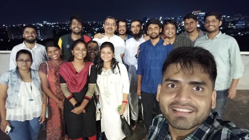 An evening group selfie